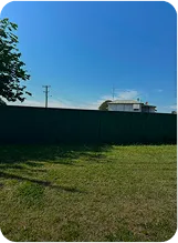 Front yard fence available for local business advertising